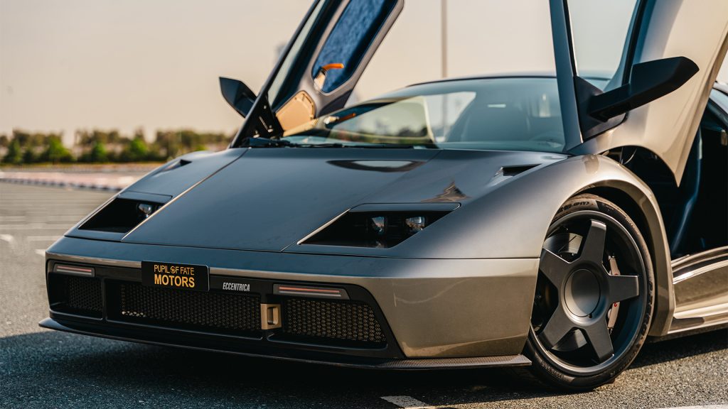 Pupil of Fate Motors تعيد إحياء أيقونة لامبورجيني "ديابلو": Eccentrica تصل الشرق الأوسط
بيبل اوف فايت موتورز تعيد إحياء أيقونة لامبورجيني ديابلة
اكستنتريكا تصل الشرق الأوسط
سيارات إيطالية
سوبر كارز
سيارات خارقة
سيارات رياضية
سيارات كلاسيكية
Pupil of Fate Motors revives the Lamborghini icon “Diablo”: Eccentrica arrives in the Middle East

Italian cars
Super cars

Sports cars
Classic cars
