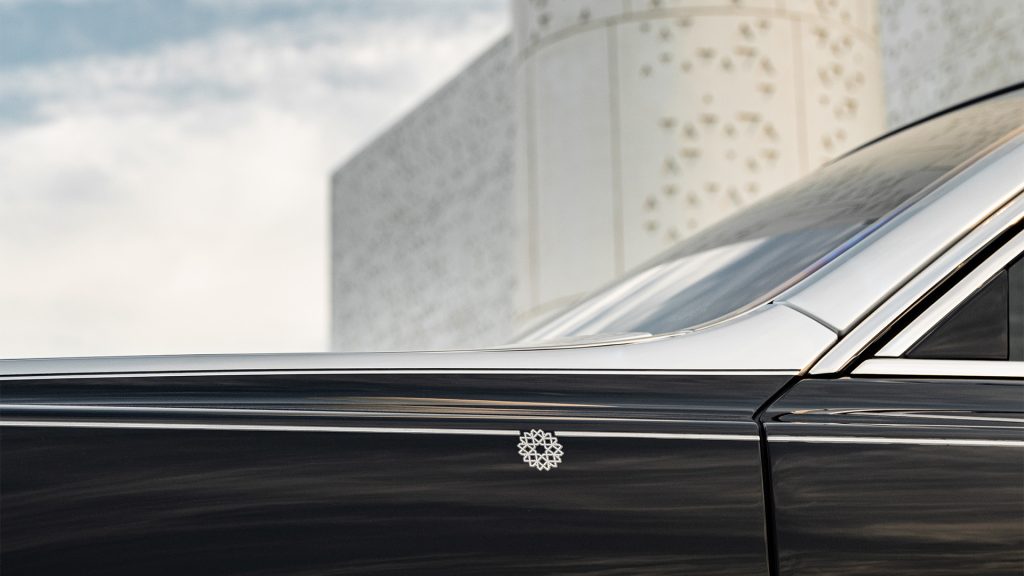 رولز رويس فانتوم أرابيسك

Rolls Royce Phantom Arabesque

سيارات رولز رويس الشرق الأوسط

رولز رويس بيسبوك

سيارات فاخرة حصرية

luxury bespoke Rolls Royce

laser engraved hood Rolls Royce

Middle East inspired luxury cars

Rolls Royce Phantom Middle East

ultra luxury bespoke cars

رولز-رويس فانتوم أرابيسك 2026 بغطاء محرّك منقوش بالليزر مستوحى من المشربية

Rolls-Royce Phantom Arabesque 2026 laser-engraved hood inspired by Mashrabiya design

تصميم خارجي ثنائي اللون لسيارة رولز-رويس فانتوم أرابيسك الفاخرة

Two-tone exterior design of Rolls-Royce Phantom Arabesque luxury sedan

تفاصيل شبكة بانثيون المضيئة وتمثال روح السعادة في فانتوم أرابيسك

Illuminated Pantheon grille and Spirit of Ecstasy on Rolls-Royce Phantom Arabesque

غاليري المقصورة مع تطعيمات خشبية مستوحاة من العمارة العربية

Bespoke dashboard gallery with Mashrabiya-inspired wood inlays inside Phantom Arabesque

مقصورة رولز-رويس فانتوم أرابيسك مع تطريزات هندسية مستوحاة من المشربية

Rolls-Royce Phantom Arabesque interior with Mashrabiya-inspired embroidery

تفاصيل نقش الليزر الحصري على غطاء المحرّك في رولز-رويس فانتوم أرابيسك

Close-up laser engraving detail on Rolls-Royce Phantom Arabesque hood