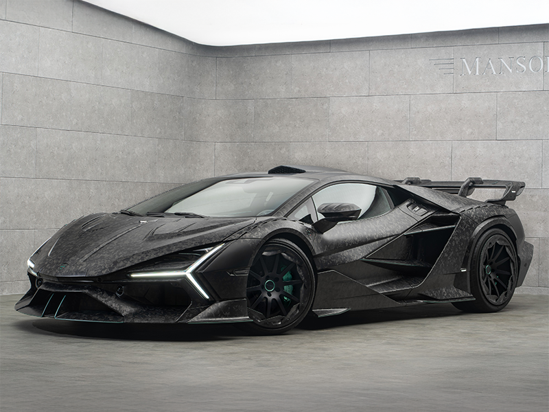 منصوري كاربونايدو اكس 2026 لامبرجيني ريفويلتو معدلة من منصوري Carbonado X من منصوري ريفيولتو بألياف الكربون المخبوز منصوري لامبورغيني V12 هجينة تصميم منصوري الكربوني الكامل جناح منصوري ريفويلتو الخلفي عادم مثلث منصوري ريفويلتو عجلات كربونية منصوري 21 و22 إنش داخلية منصوري الكانتارا الفاخرة لامبورغيني ريفويلتو 1120 حصان سوبركار منصوري One Off منصوري ريفويلتو 2026 من الخلف واجهة منصوري ريفويلتو الجديدة تفاصيل كربون مخبوز منصوري Mansory Carbonado X 2026 Lamborghini Revuelto Mansory Carbonado X full carbon body Mansory baked carbon fiber Lamborghini Revuelto 1120 hp Mansory Revuelto V12 hybrid Mansory One Off supercar Mansory Revuelto rear wing Mansory triangular exhaust Mansory carbon wheels 21 22 inch Mansory interior Alcantara Carbonado X hypercar styling Mansory Revuelto front fascia Lamborghini Revuelto tuned by Mansory