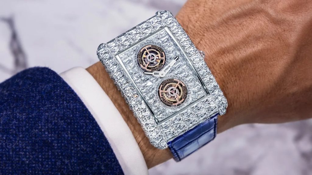 ساعة Jacob & Co
ساعة Angel Cut
Jacob & Co Billionaire
ساعة ملياردير جاكوب آند كو
ساعات فاخرة مرصعة بالألماس
ساعة توربيون مزدوج
ساعات هاي جولري
سعر ساعة Jacob & Co
ساعات فاخرة 2026
ساعات ألماس فاخرة
Jacob & Co Angel Cut
ساعة فاخرة 3.4 مليون دولار
ساعة Jacob & Co Billionaire Angel Cut مرصعة بالألماس
تصميم ساعة Angel Cut مع توربيون مزدوج
تفاصيل ألماس Angel Cut في ساعة فاخرة
ساعة Jacob & Co بعلبة من الذهب الأبيض
توربيون مزدوج في ساعة Billionaire
مقطع داخلي لحركة JCAM50 في ساعة فاخرة
سوار جلد تمساح أزرق لساعة Jacob & Co
تفاصيل 298 حجر ألماس في ساعة Angel Cut
ساعة فاخرة بإصدار محدود من Jacob & Co
تصميم فاخر لساعات هاي جولري مرصعة بالألماس
Jacob and Co watch
Angel Cut watch
Billionaire Double Tourbillon
Jacob and Co Billionaire
luxury diamond watch
high jewelry watches
double tourbillon watch
Jacob and Co price
luxury watches 2026
diamond luxury watch
Angel Cut diamonds
$3.4 million watch
Jacob and Co Billionaire Angel Cut diamond watch
Angel Cut watch with double tourbillon
close-up of Angel Cut diamonds on luxury watch
Jacob and Co white gold case watch
double tourbillon mechanism in Billionaire watch
JCAM50 movement inside luxury watch
blue alligator strap on Jacob and Co watch
298 diamond details on Angel Cut watch
limited edition Jacob and Co luxury watch
high jewelry diamond watch design