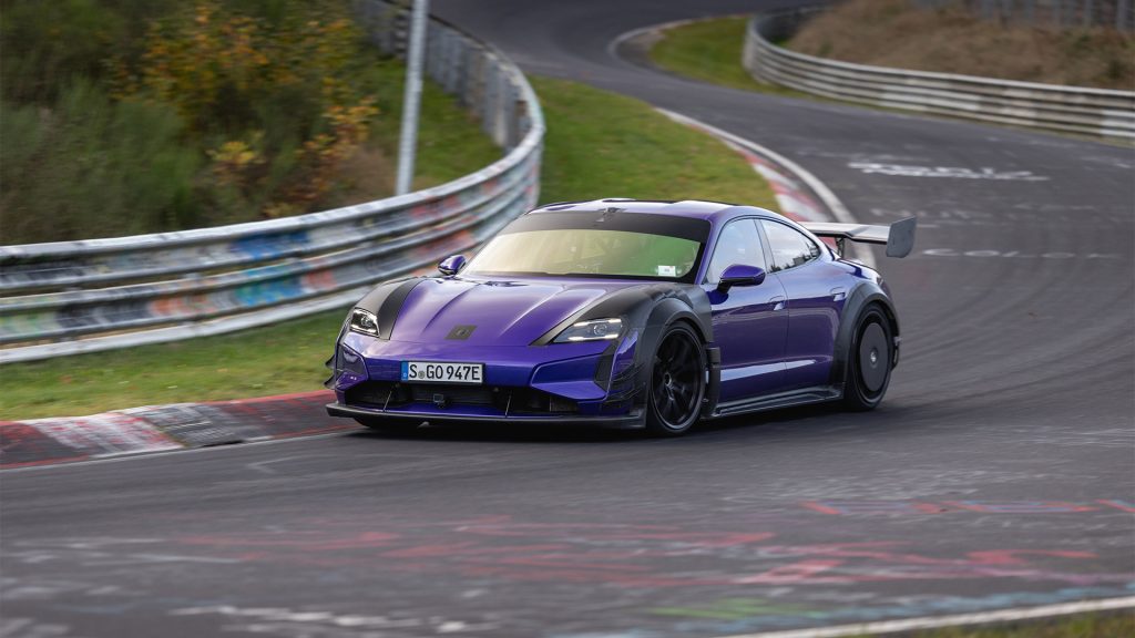 بورشه تايكان توربو GT
Porsche Taycan Turbo GT
مانثي ريسينغ
Manthey Racing
نوربورغرينغ
رقم قياسي نوربورغرينغ
أسرع سيارة كهربائية
بورشه كهربائية
Taycan Turbo GT Manthey
تايكان مانثي
سيارات كهربائية رياضية
بورشه تايكان 2026
قوة ضغط سفلي
بورشه حلبات
سيارات أداء كهربائية
سباقات نوربورغرينغ
Attack Mode بورشه
بورشه ضد شاومي SU7 Ultra
سيارات كهربائية ألمانية
أسرع سيدان كهربائية
بورشه تايكان توربو GT المعدلة من مانثي على حلبة نوربورغرينغ
سيارة Porsche Taycan Turbo GT خلال تسجيل الرقم القياسي
الجناح الخلفي الضخم في تايكان مانثي الجديدة
تصميم هوائي متطرف لسيارة بورشه تايكان Turbo GT
بورشه كهربائية عالية الأداء على حلبة السباق
تفاصيل الكربون المكشوف في Taycan Turbo GT Manthey
بورشه تايكان الكهربائية أثناء الهجوم على المنعطفات
نظام الديناميكية الهوائية في بورشه مانثي
جنوط خفيفة الوزن في بورشه تايكان المعدلة
Porsche Taycan Turbo GT تحقق زمن قياسي في نوربورغرينغ
Porsche Taycan Turbo GT
Taycan Turbo GT Manthey
Manthey Racing
Nürburgring record
fastest EV sedan
Porsche EV record
Porsche Taycan 2026
electric performance car
Nürburgring electric car
Porsche downforce
electric super sedan
Porsche Attack Mode
Xiaomi SU7 Ultra vs Porsche
performance EV
Porsche track car
electric lap record
Porsche Manthey kit
German electric sports car
Taycan Nürburgring
EV performance sedan
Porsche Taycan Turbo GT Manthey on Nürburgring track
Porsche Taycan Turbo GT during record lap run
Massive rear wing on the Manthey-modified Taycan
Extreme aerodynamic design of the Porsche Taycan Turbo GT
High-performance Porsche EV on racetrack
Exposed carbon fiber details on Taycan Turbo GT Manthey
Porsche Taycan attacking corners at high speed
Aerodynamic package on Porsche Manthey edition
Lightweight wheels fitted to the modified Taycan Turbo GT
Porsche Taycan Turbo GT setting Nürburgring record
