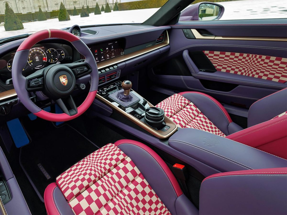بورشه 911 GT3 Touring بورشه 911 جي تي 3 تورينج بورشه مولدوفا Sonderwunsch مقصورة بورشه 911 نسخة خاصة بورشه بورشه 911 GT3 خاصة سيارات رياضية فاخرة بورشه 911 2026 تصميم داخلي بورشه بورشه 911 GT3 Touring الخاصة بطلاء متدرج احتفالاً بمرور 15 عاماً على بورشه مولدوفا الواجهة الأمامية لسيارة بورشه 911 GT3 Touring الخاصة بتشطيبات فريدة بورشه 911 GT3 Touring بطلاء متدرج من البنفسجي إلى الماجنتا التصميم الجانبي لنسخة بورشه 911 GT3 Touring المخصصة عبر برنامج Sonderwunsch مقصورة بورشه 911 GT3 Touring بجلد ليليكي وقماش باشا الفاخر مقاعد بورشه 911 GT3 Touring مع تطعيمات Ruby Star Neo وخياطة متباينة لوحة قيادة بورشه 911 GT3 Touring مع تطعيمات خشب Paldao الفاخر مقبض ناقل الحركة اليدوي في بورشه 911 GT3 Touring بتطعيمات خشبية رسم شجرة الحياة الذهبي على هيكل بورشه 911 GT3 Touring الخاصة Golden Tree of Life artwork on the bespoke Porsche 911 GT3 Touring Wood-trimmed manual gear lever in the Porsche 911 GT3 Touring Porsche 911 GT3 Touring dashboard with luxurious Paldao wood trim Porsche 911 GT3 Touring seats featuring Ruby Star Neo accents and contrast stitching Porsche 911 GT3 Touring interior with lilac leather and premium Pasha fabric Side profile of the Porsche 911 GT3 Touring customized through Sonderwunsch Porsche 911 GT3 Touring featuring a purple-to-magenta gradient paint finish Front three-quarter view of the bespoke Porsche 911 GT3 Touring Special Porsche 911 GT3 Touring with gradient paint celebrating Porsche Moldova's 15th anniversary Pasha Fabric Porsche Sonderwunsch Porsche 911 GT3 Touring Porsche GT3 Touring Porsche Sonderwunsch Porsche Moldova Porsche special edition Porsche 911 interior Pasha fabric interior Porsche GT3 custom build Porsche anniversary edition luxury sports car interior Porsche 911 bespoke one-off Porsche 911